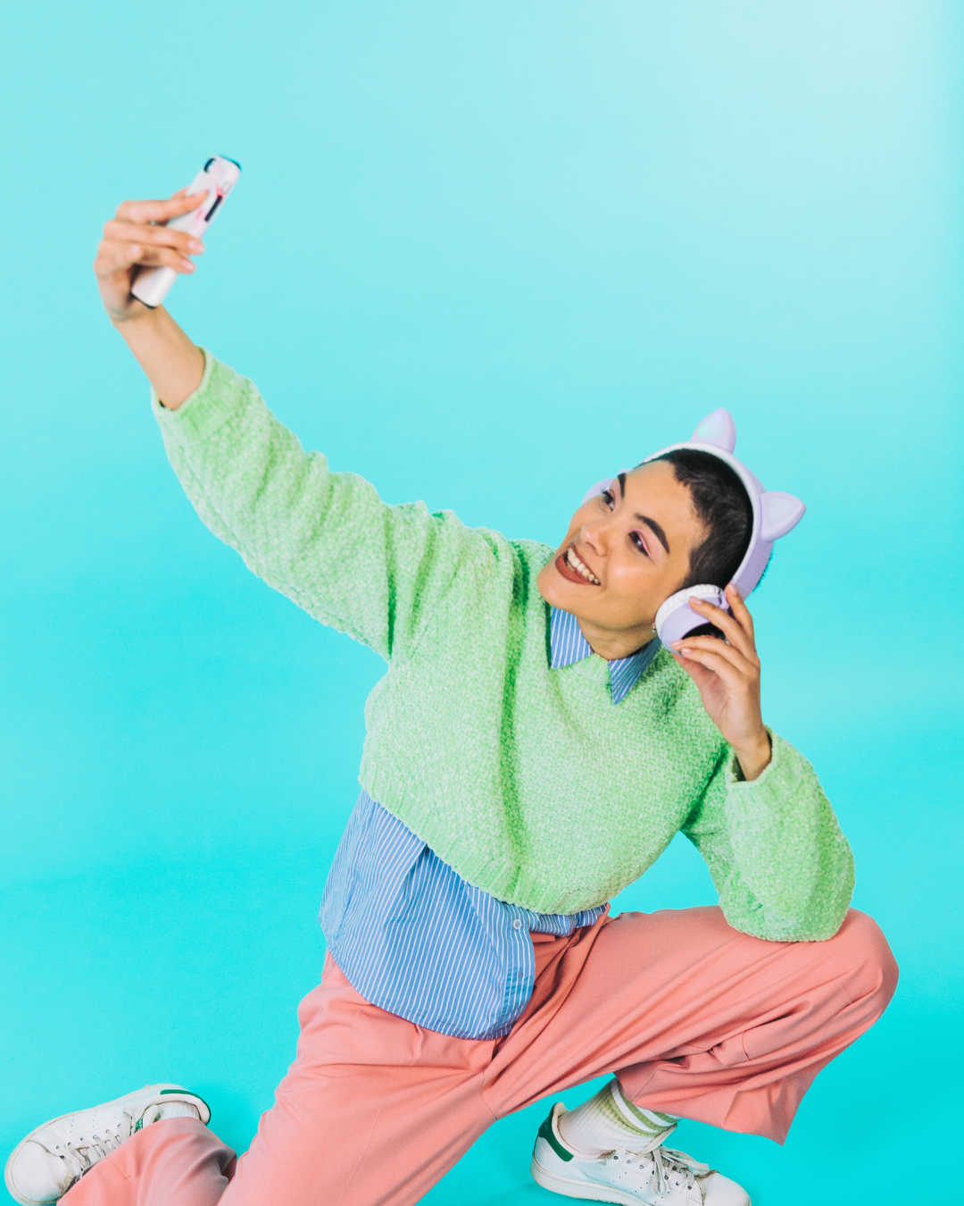 Student creator taking a self-portrait
